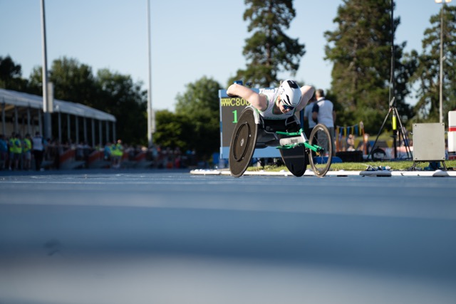 Wheelchair 800m racers pushing down the home straight